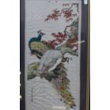 A pair of Chinese needleworks depicting peacocks, birds and blossom each signed 59 x 28cm