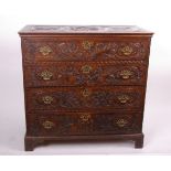 A 17th Century style oak chest, with four carved drawer fronts and spiral twist decoration to top,