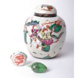 A Chinese ginger jar together with a faux jade carving of a fish.