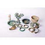 A collection of antiquities and other items to include a 12thC iridescent Islamic glass jar, a