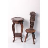 A carved octagonal jardiniere stand 71cm high, and carved oak spinning chair