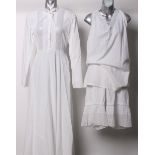 A quantity of late 19th and early 20th Century costume, comprising full length white cotton dress