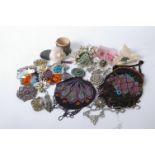 A collection of beaded trimmings, an early 20th Century beaded evening bag, costume jewellery,