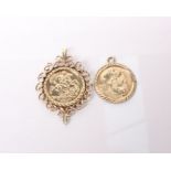 Two 9ct gold pendant medallions. A St Christopher's medal in a bezel mount together with a St