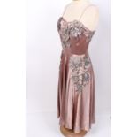 A 1930s grey and black patterned floral chiffon dress; a black sheer net evening gown decorated with