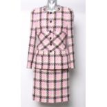 A late 1990s Chanel Boutique label Karl Lagerfeld pink checked bouclé wool tailored suit with 100%