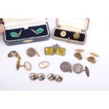 A collection of cufflinks to include a pair of silver and malachite cufflinks together with a pair