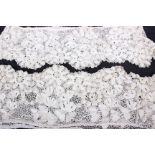 Late 19th Century/early 20th Century lace, to include an Irish crochet lace blouse, two wide