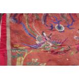 Late 19th/early 20th Century Chinese embroidered red silk panel; worked in coloured satin stitch and