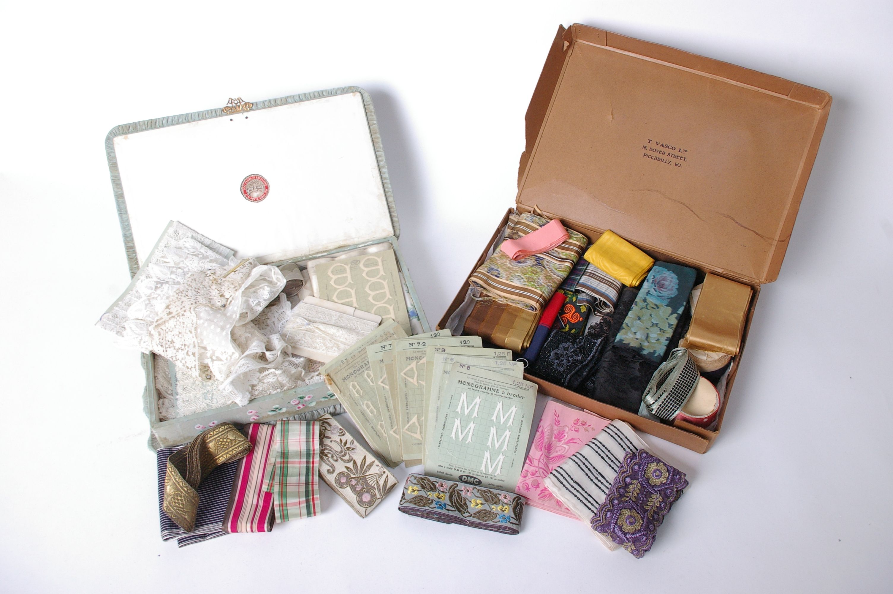 1920s painted silk chocolate box containing lace, ribbon and trimmings, including Brussels point