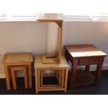 A nest of three light oak tables, four other occasional tables, together with two chairs and a