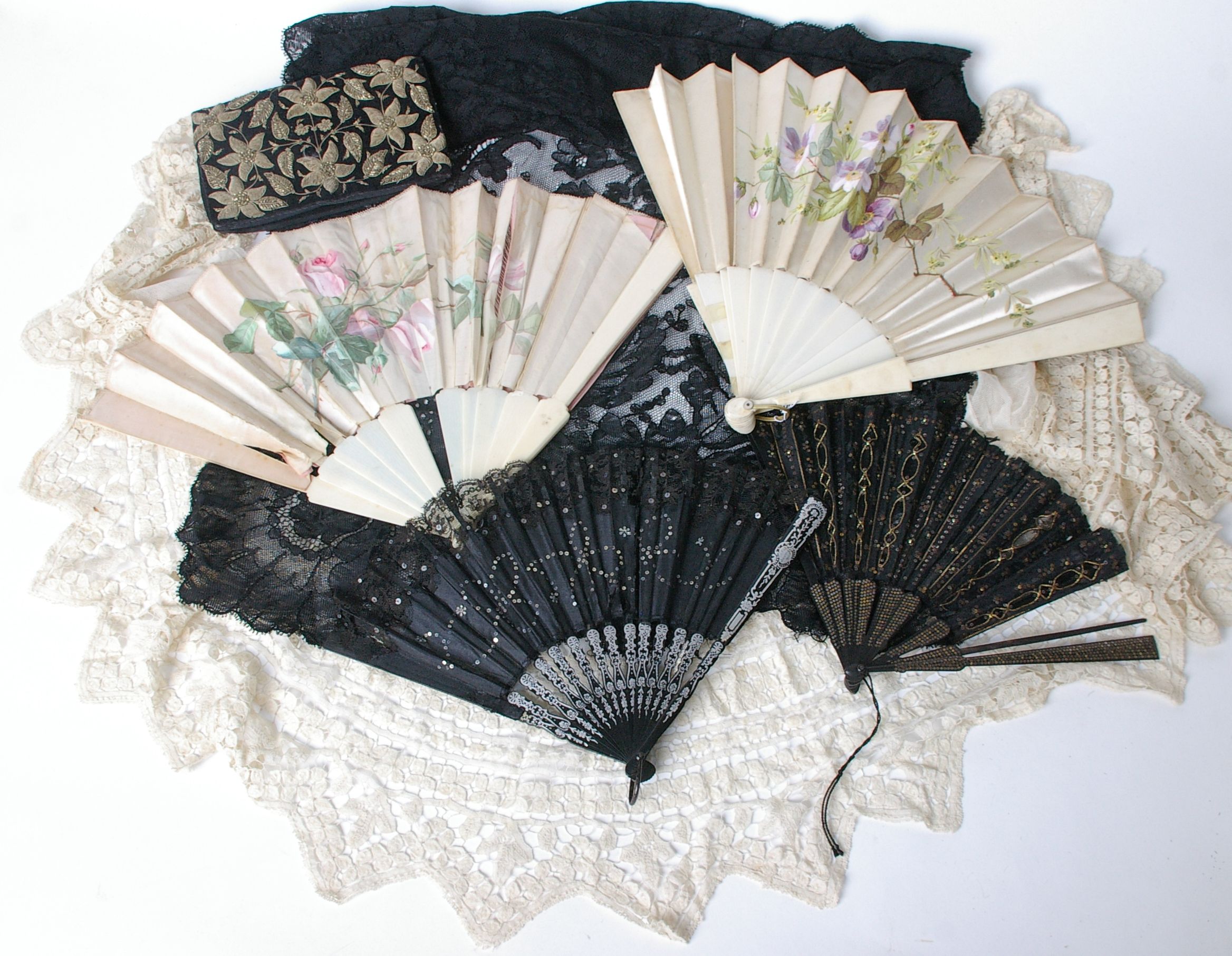 A collection of late 19th and early 20th Century accessories and lace, including collars, edgings,