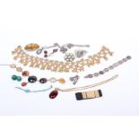 A collection of costume jewellery to include an agate and white metal necklace, a moss agate pendant