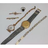 A collection of watches and jewellery to include a 9ct gold watch, white enamel face on a yellow