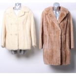 A late 1950s three quarter length pale musquash coat; a 1960s jasmine pale mink jacket ; two reptile