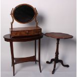 An Edwardian mahogany oval occasional table with inlay detail 70cm high, 73cm wide, 42cm deep, a