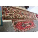 A Middle Eastern runner approx 75 x 270cm and another smaller example (2)