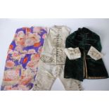 A 19th Century child's cream silk embroidered waistcoat, trousers and green velvet coat with