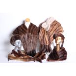 Two 1950s fur stoles; a mink headband, an F K Bauers fur wrap with tails, a musquash fur stole, a St
