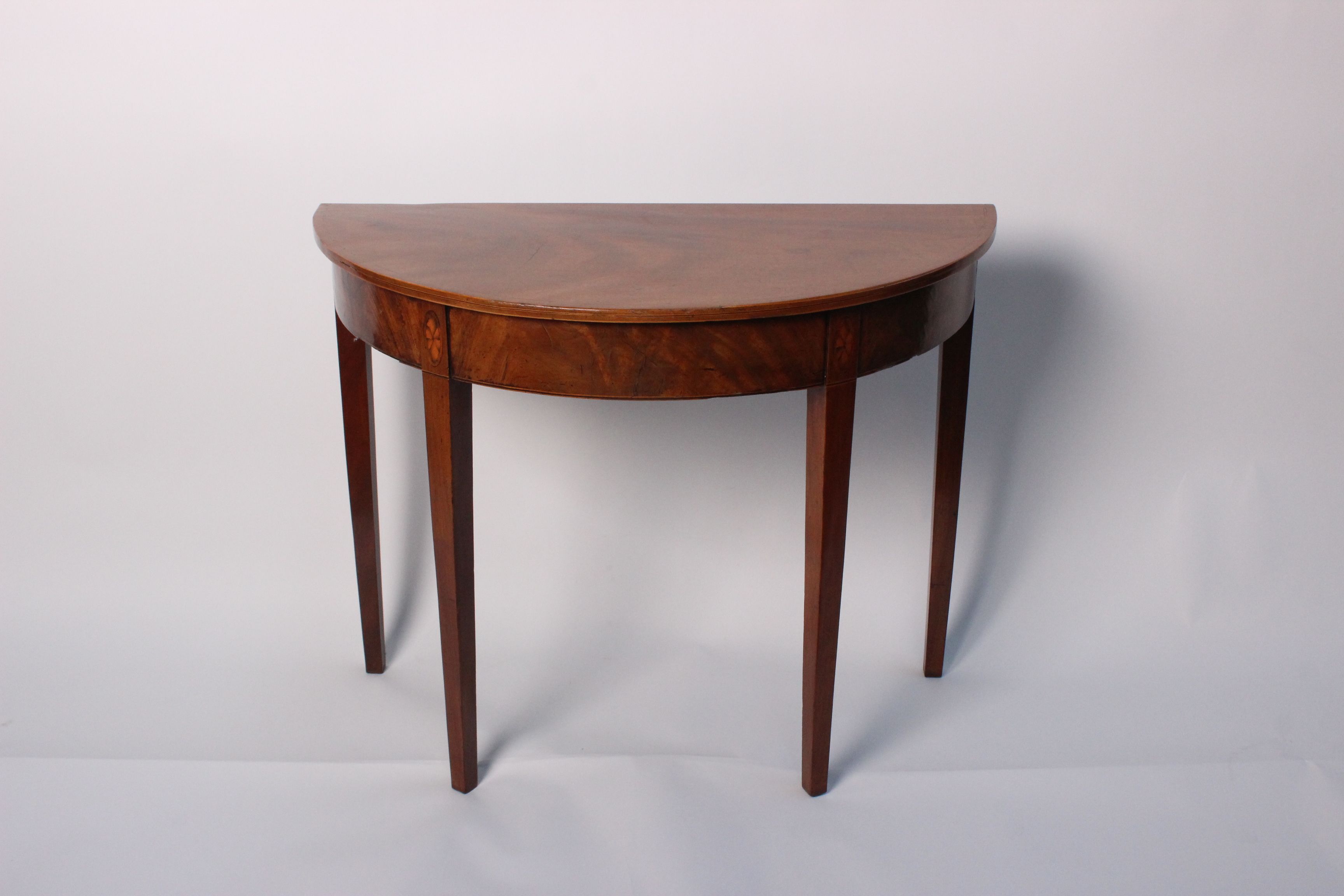 A 19th Century mahogany and inlaid D-shaped side table 71cm high, 91cm wide, 45cm deep