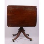 A 19th Century mahogany tilt top mahogany breakfast table 74cm high, 102cm wide