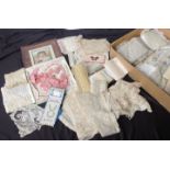 Two boxes of late 19th and early 20th Century black and cream lace and accessories, including a