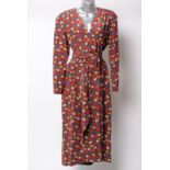 A 1980s brown patterned silk wraparound dress, with a Christian Dior Boutique label, zip cuffs and a