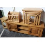 A group of light oak furniture, to include a TV/entertainment unit (h: 56cm w: 151cm d: 40cm),