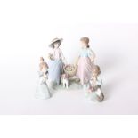 A Lladro figural group 'Springtime Harvest' two children holding a basket with a dog, no 6250,