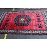 A Turkish rug 283 x 163cm and another example 280 x 140cm