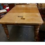 A Victorian mahogany dining table with two additional leaves 200cm extended