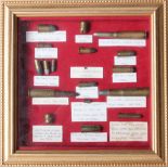 Ammunition. A small framed and glazed display case containing seventeen decommissioned 19th/20th