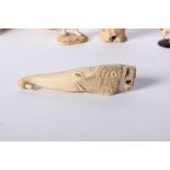 A collection of Ivory Items to include two carved parasol handles, a netsuke, two carved figurines