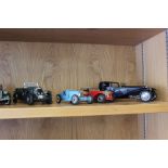 Eight assorted Franklin Mint precision models, to include a Cadillac roadster, Bugatti Royale,