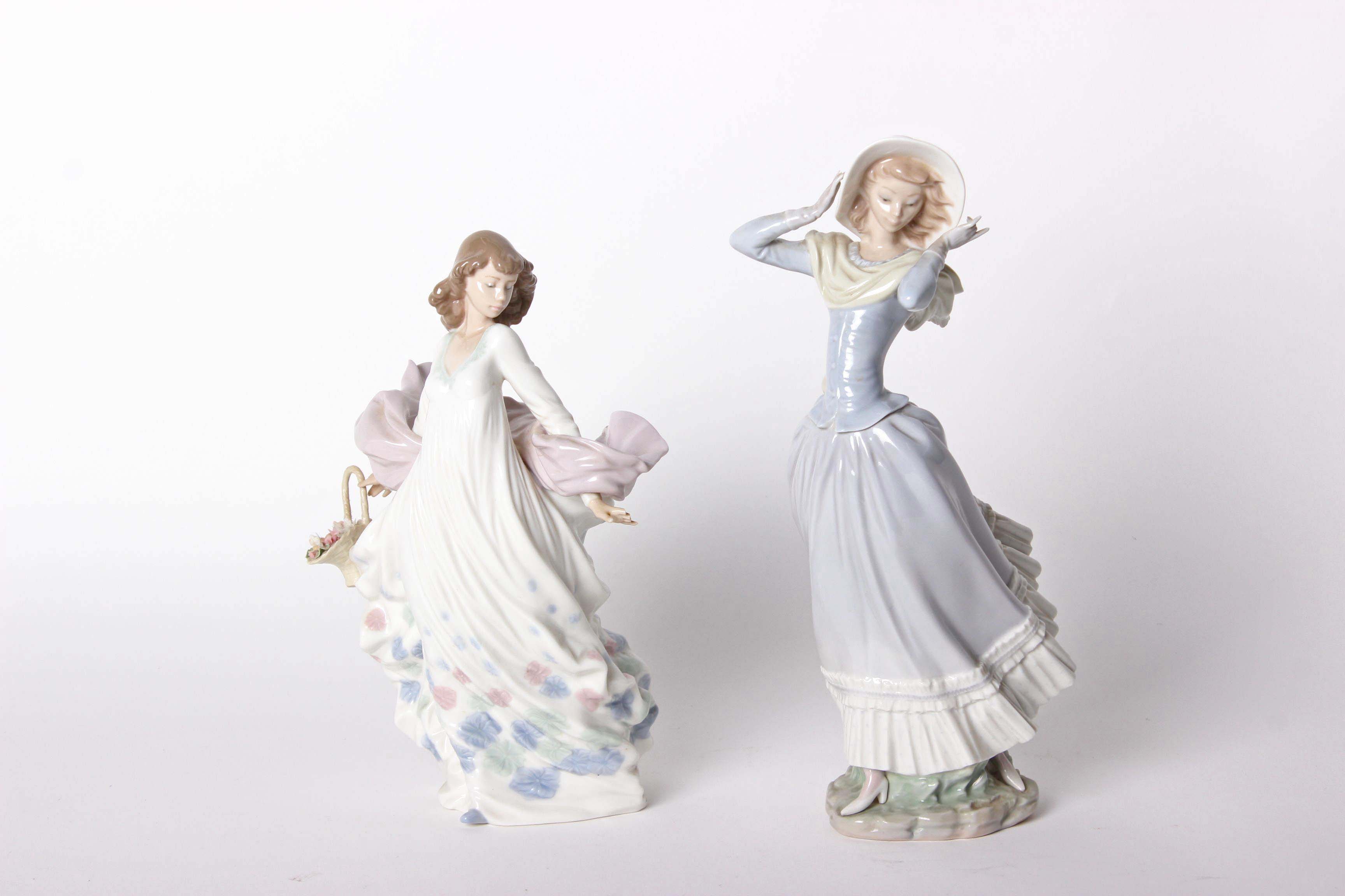 A Lladro figure 'Spring Splendour' no. 5898, together with another Lladro lady clutching her