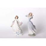A Lladro figure 'Spring Splendour' no. 5898, together with another Lladro lady clutching her
