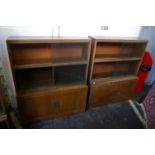 A pair of Minty oak bookcases each 109cm high, 90cm wide together with another larger Minty bookcase