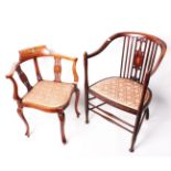 An Edwardian mahogany and inlaid corner chair and a further armchair
