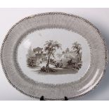 A large 19th Century Staffordshire brown transfer printed meat plate centred by Oriental scene