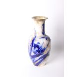 Large Doulton Burslem vase, underglaze blue design of irises, with over glaze matt gilding (height