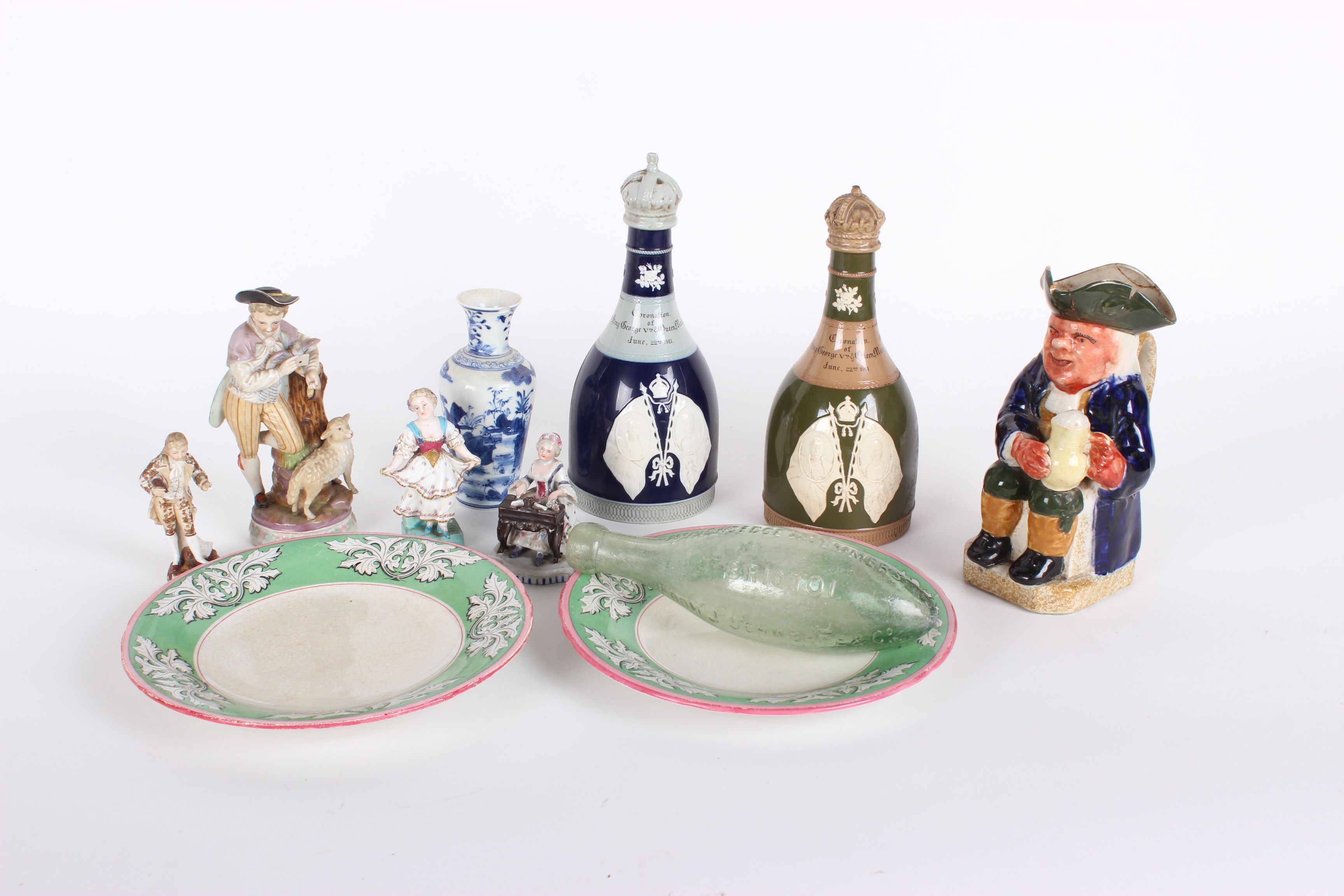 A pair of Copeland Spode stoneware bottles to commemorate the coronation of King George V, with