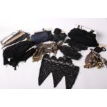 A quantity of early 20th Century blue, black and grey edgings from France, black fringing, beaded