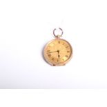 A 14k gold ladies open faced 30mm key wind pocket watch. Gold engraved face with Roman numeral baton