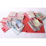 A quantity of textiles suitable for creative projects, including pink dyed linen, Welsh blanket