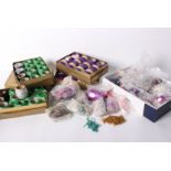 Boxes of unused metallic crochet threads, and a collection of colourful beads and sequins suitable