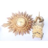 Two clocks to include a brass skeleton clock and a gilt sunburst wall clock.