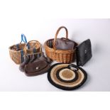 Two late 1940s wicker shopping baskets; a brown leather 1940s clutch bag, a 1960s pale lilac woven