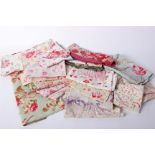 A collection of late 19th and early 20th Century quilted eiderdown pieces and scraps, English and