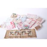 A collection of inspiration packs made up of haberdashery with antique and vintage fabrics; a