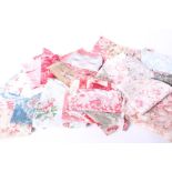 A quantity of small textile fragments, including a French Toile de Jouy scrap circa 1800, early 20th